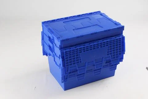 Plastic box with a lid, on a white background Stock Photos
