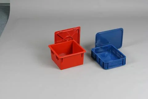 Plastic box with a lid, on a white background Stock Photos