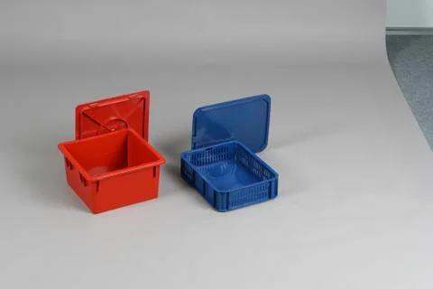 Plastic box with a lid, on a white background Stock Photos