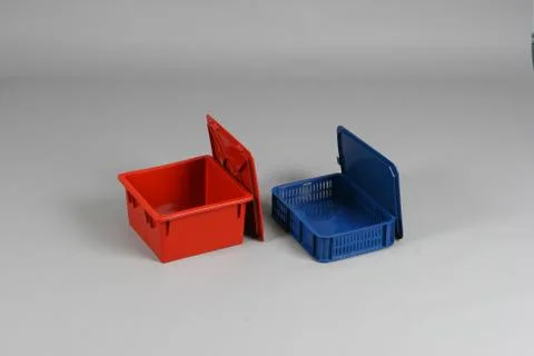 Plastic box with a lid, on a white background Stock Photos