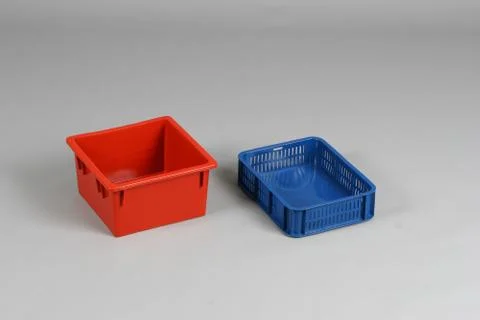 Plastic box with a lid, on a white background Stock Photos