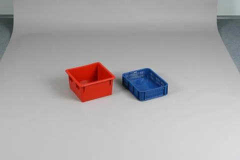 Plastic box with a lid, on a white background Stock Photos