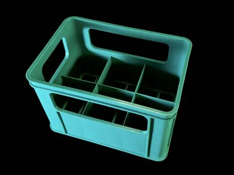 Plastic box for transporting bottles, on a black background. Turquoise contai Photos