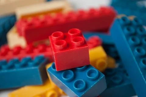 Plastic bricks construction on white background 写真素材