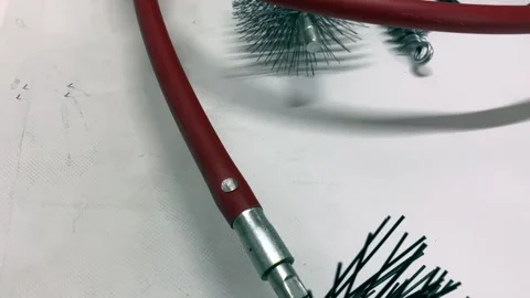 Plastic brush and cable, for cleaning scorched booth systems. Vídeos de archivo 253090477