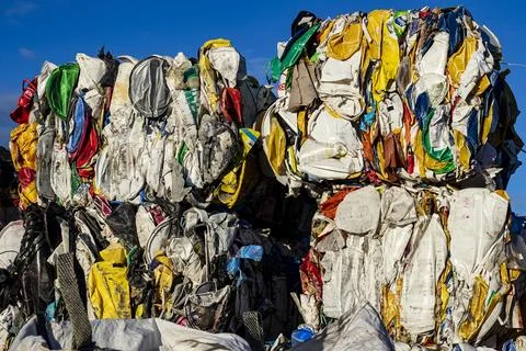 Plastic buckets compressed into bales Stock Photos