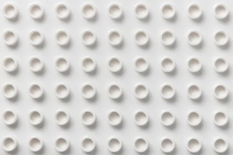 Plastic building block pattern of white color. Abstract background for copy s 스톡 사진