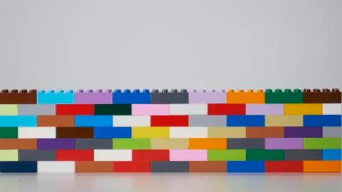 Plastic building block. plastic brick wall. Wall from Plastic building blocks Foto stock