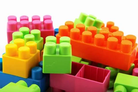 Plastic building blocks Plastic building blocks on a white background Copy... Stock Photos