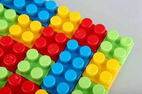 Plastic building blocks Plastic building blocks on a white background Copy... Stock Photos