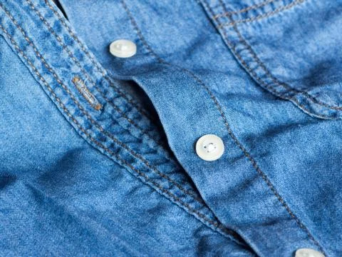 Plastic button on a shirt Foto stock