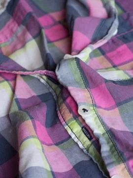 Plastic button on a shirt Foto stock