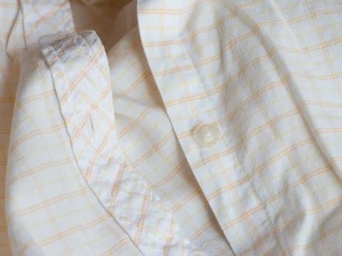 Plastic button on a shirt Foto stock