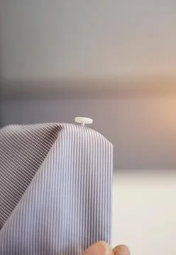 Plastic button on shirt. Foto stock