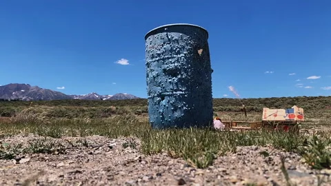 Plastic can target being shot at, falls over, outdoor shooting range, slow Video stock 202003964
