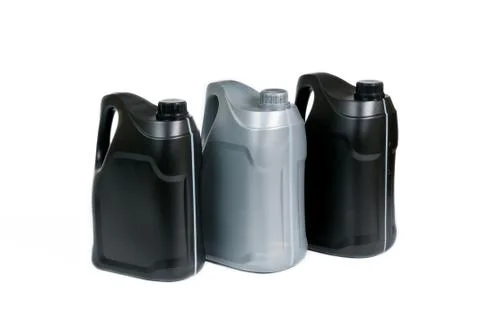 Plastic canisters for machine oil Stock Photos