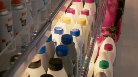 Plastic Cans With Engine Oils And Lubricants Are In Auto Parts Store Video stock 155462453