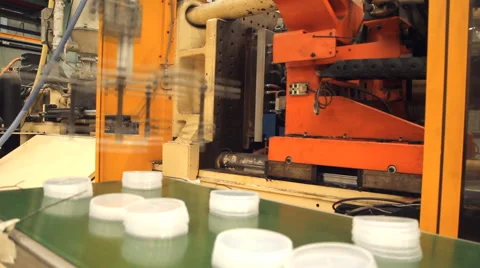 Plastic cap injection moulding machine Stock Footage 65008868