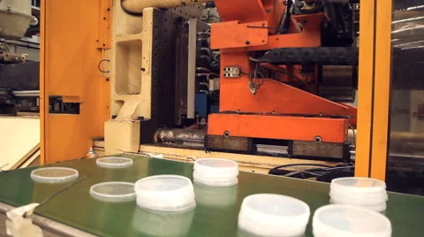 Plastic cap injection moulding machine Video stock 65010606