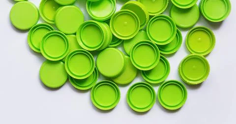 Plastic cap isolated on white background. Recycle material concept. Stock Photos