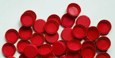 Plastic cap isolated on white background. Recycle material concept. Foto stock