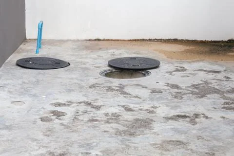 Plastic caps of the septic system of the house Stock Photos