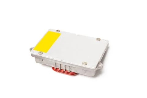 Plastic car engine control unit with metal elements on a white isolated backg Stock Photos