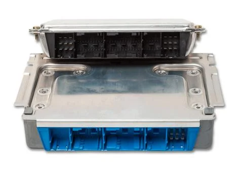 Plastic car engine control unit with metal elements on a white isolated backg Stock Photos