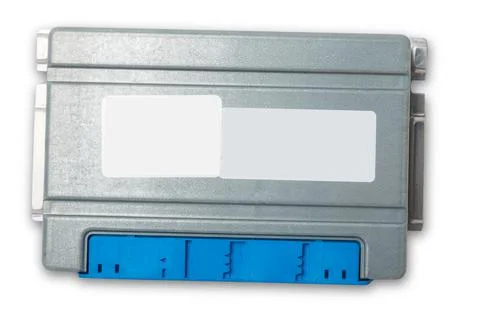 Plastic car engine control unit with metal elements on a white isolated backg Stock Photos