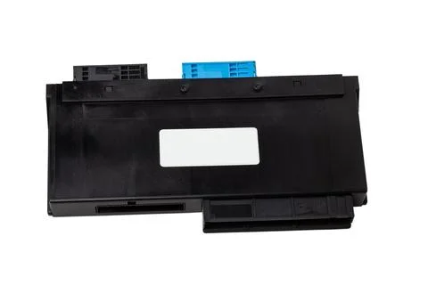 Plastic car engine control unit with metal elements on a white isolated backg Stock Photos