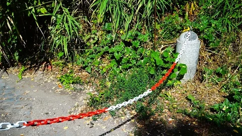 Plastic chain with white and red rings to prevent transit Stock Footage 94828278
