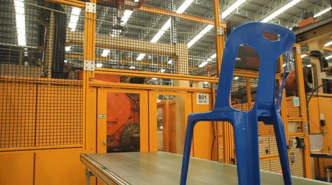 Plastic chair making machine in factory Stock Footage 65009289