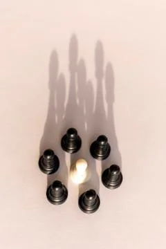 Plastic chess pawn circle with shadow shaped as crown on white background. Te Stock Photos