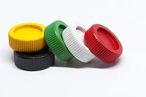 Plastic chips in a pile on white background Stock Photos
