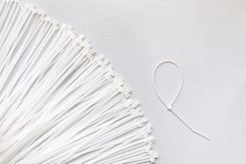 Plastic clamps, universal plastic cable ties close-up Stock Photos