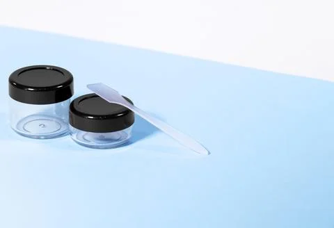 Plastic clear travelling bottles for Make-up Cosmetic: cream, lotion Stock Photos