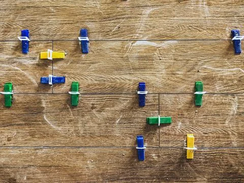 Plastic clips and wedges securing tiles in place for perfect alignment.  Ti.. Stock Photos