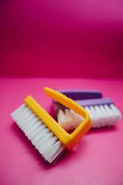 Plastic clothes brushes Stock Photos