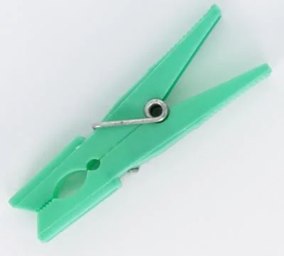 Plastic clothespins of different colors Foto stock
