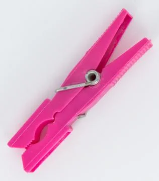 Plastic clothespins of different colors Stock Photos