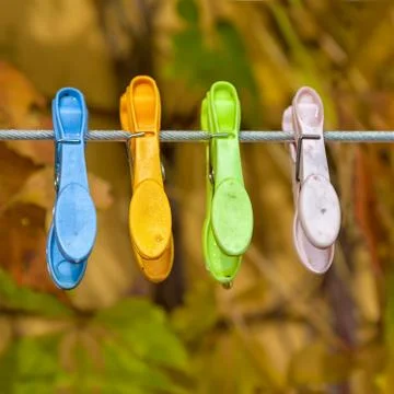 Plastic clothespins Stock Photos