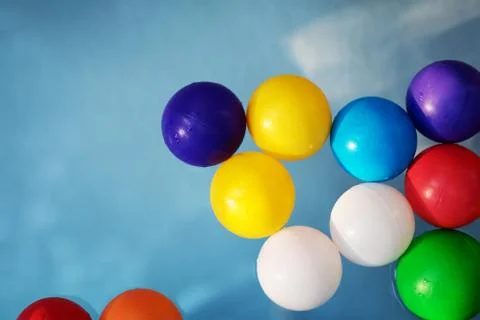 Plastic colored balls in the children's pool. Stock Photos