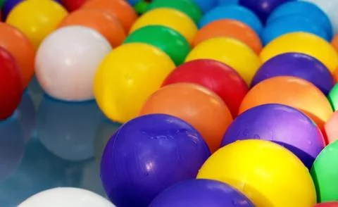 Plastic colored balls in the children's pool Stock Photos