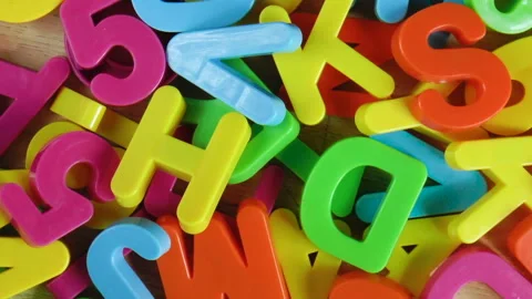 Plastic colored letters and numbers. Alphabet Stock Footage 94666078