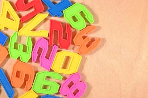 Plastic colored numbers close up Stock Photos