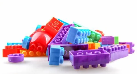 Plastic colorful toy blocks isolated on white Stock-Fotos