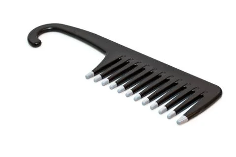 Plastic comb on a white background Stock Photos