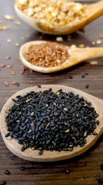 Plastic composition with different types of grains and grains on a brown back Stock Photos