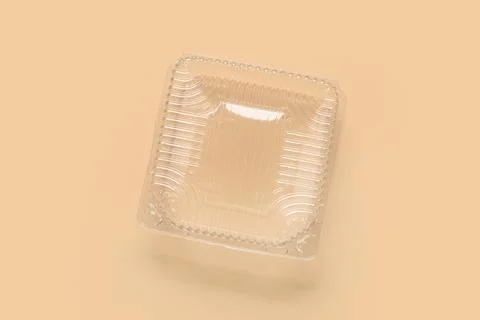 Plastic container for food on beige background, top view Stock Photos