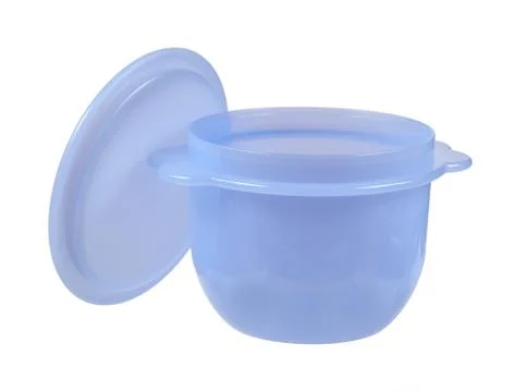 Plastic container with the lid open, isolated on white Stock Photos